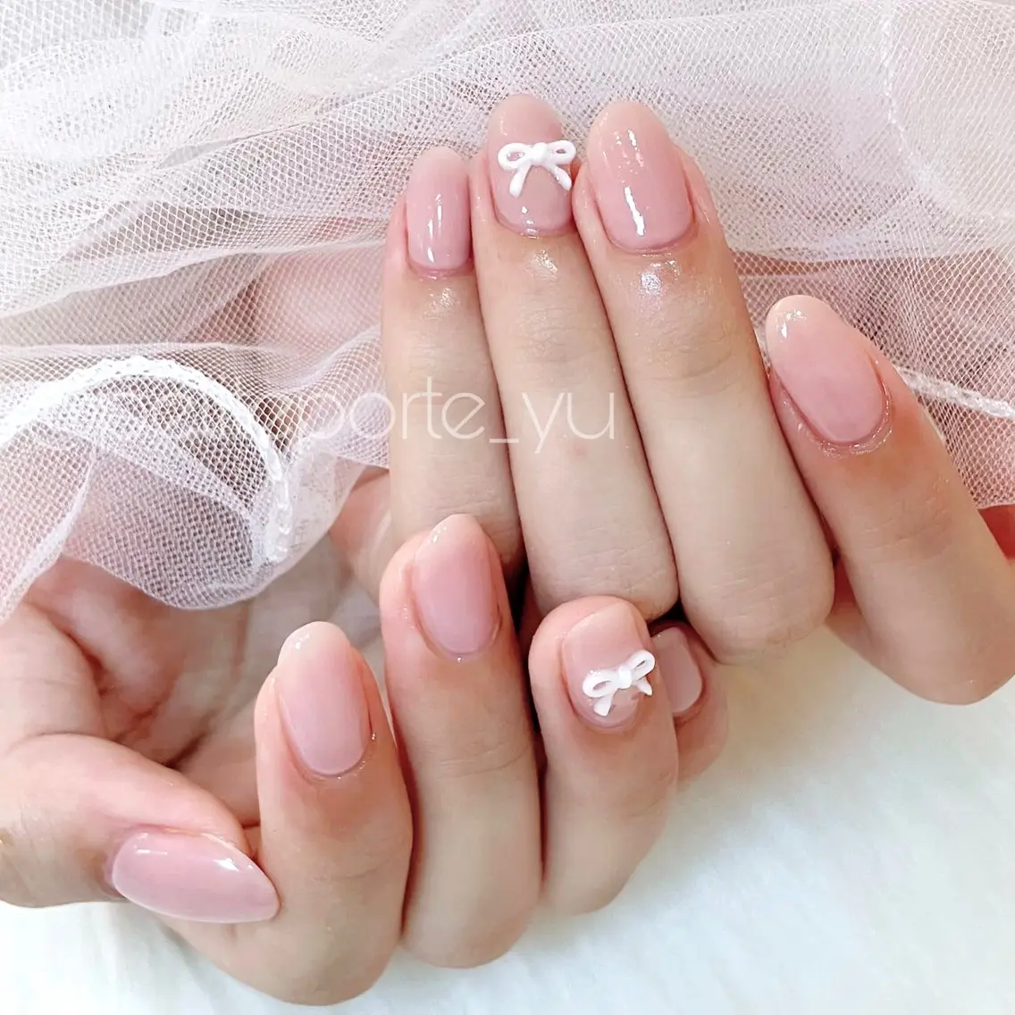 ネイル アートネイル ワンカラーネイル ピンク リボン シンプルネイル ハンドネイル petite porteのネイルデザイン