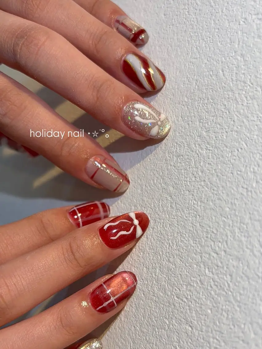 ネイル マグネットネイル リボン 冬ネイル クリスマス ハンドネイル nué nail 【halu】のネイルデザイン