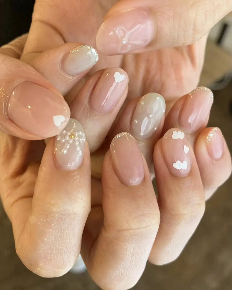 ネイル ハート リボン ハンドネイル DEEP nail salonのネイルデザイン