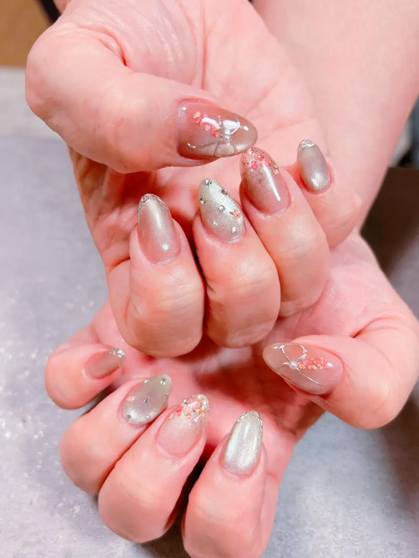 ネイル 桜ネイル ハート マグネットネイル ニュアンスネイル リボン ハンドネイル ハンドケア 💫ゆか_ Nailartistのネイルデザイン