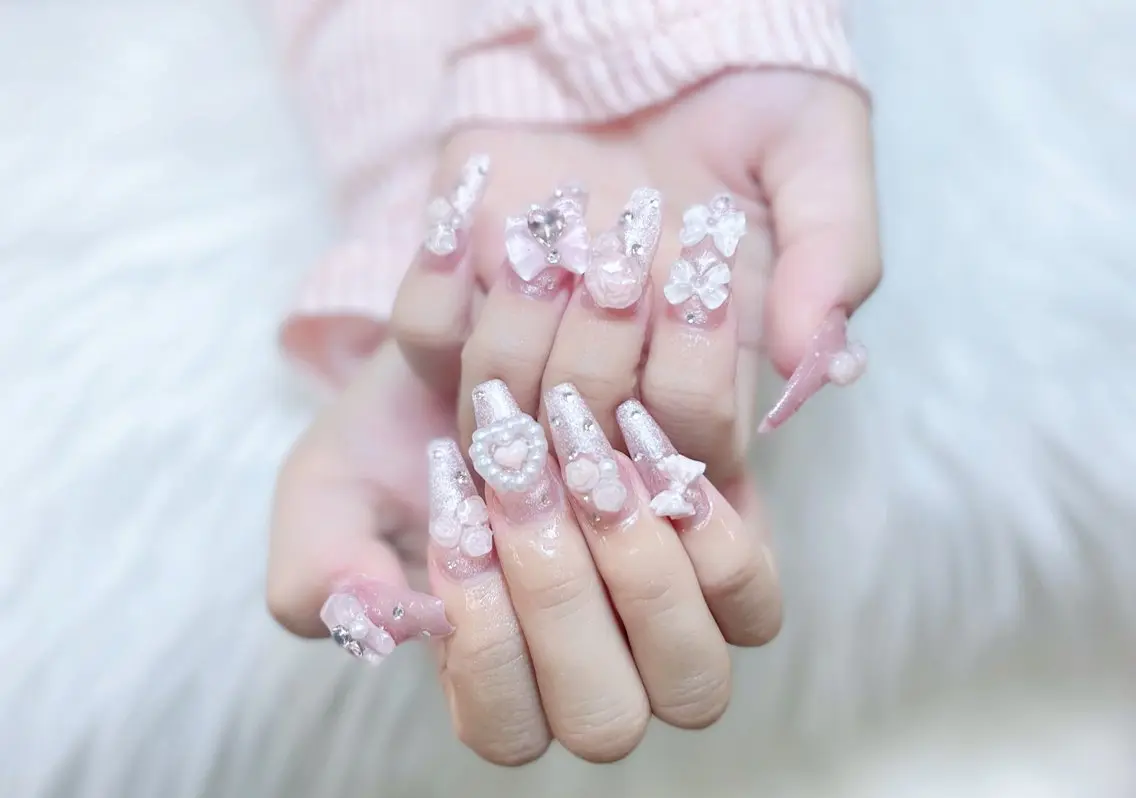 ネイル 成人式 ロングネイル マグネットネイル 大理石ネイル(マーブル) リボン ハンドネイル Amee Nail Salonのネイルデザイン