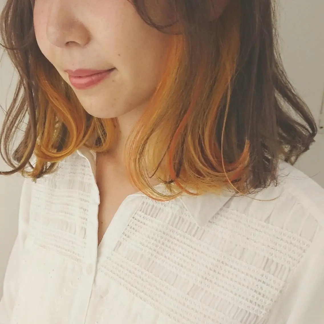 ミディアム カラー インナーカラー オレンジ イエローカラー ハロウィン ヘアカラー トリートメント coii コイ【原宿/表参道】のヘアスタイル