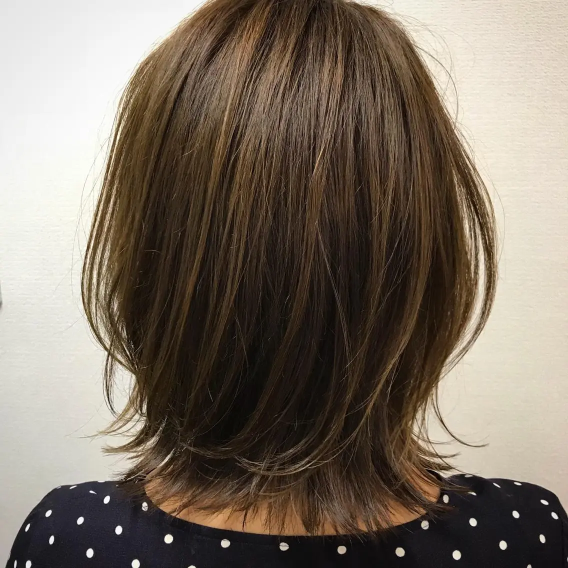伸ばし中の方限定スタイルチェンジなしの毛量調節カットの写真