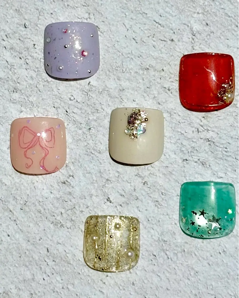 【フット】親指アート6種(オフなし)の写真