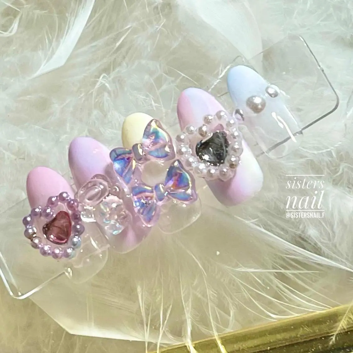 ネイル アートネイル ブルー ハート パステルネイル リボン sisters nail.fのネイルデザイン