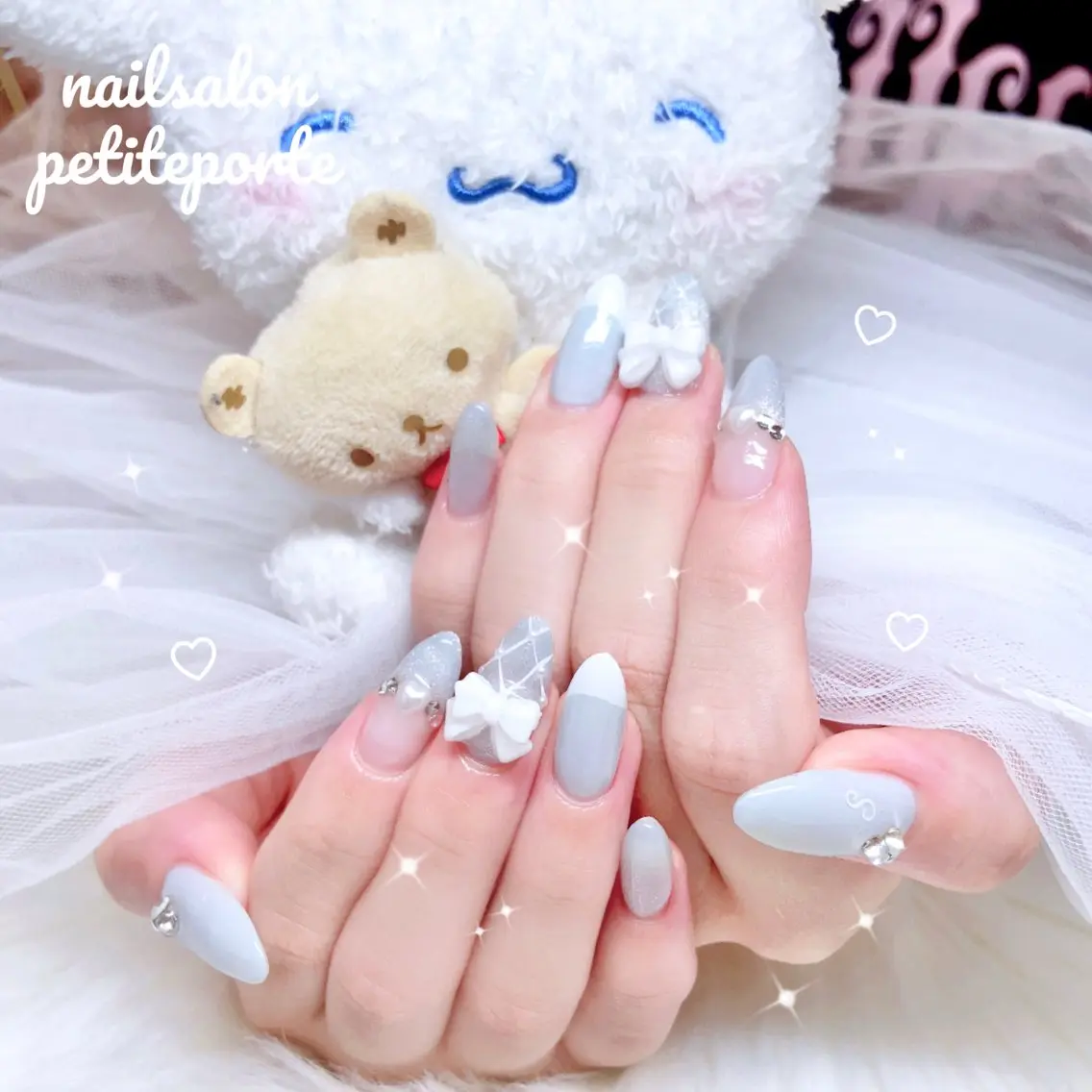 ネイル フレンチネイル ガーリー 韓国ネイル 水色 リボン ハンドネイル petite porteのネイルデザイン
