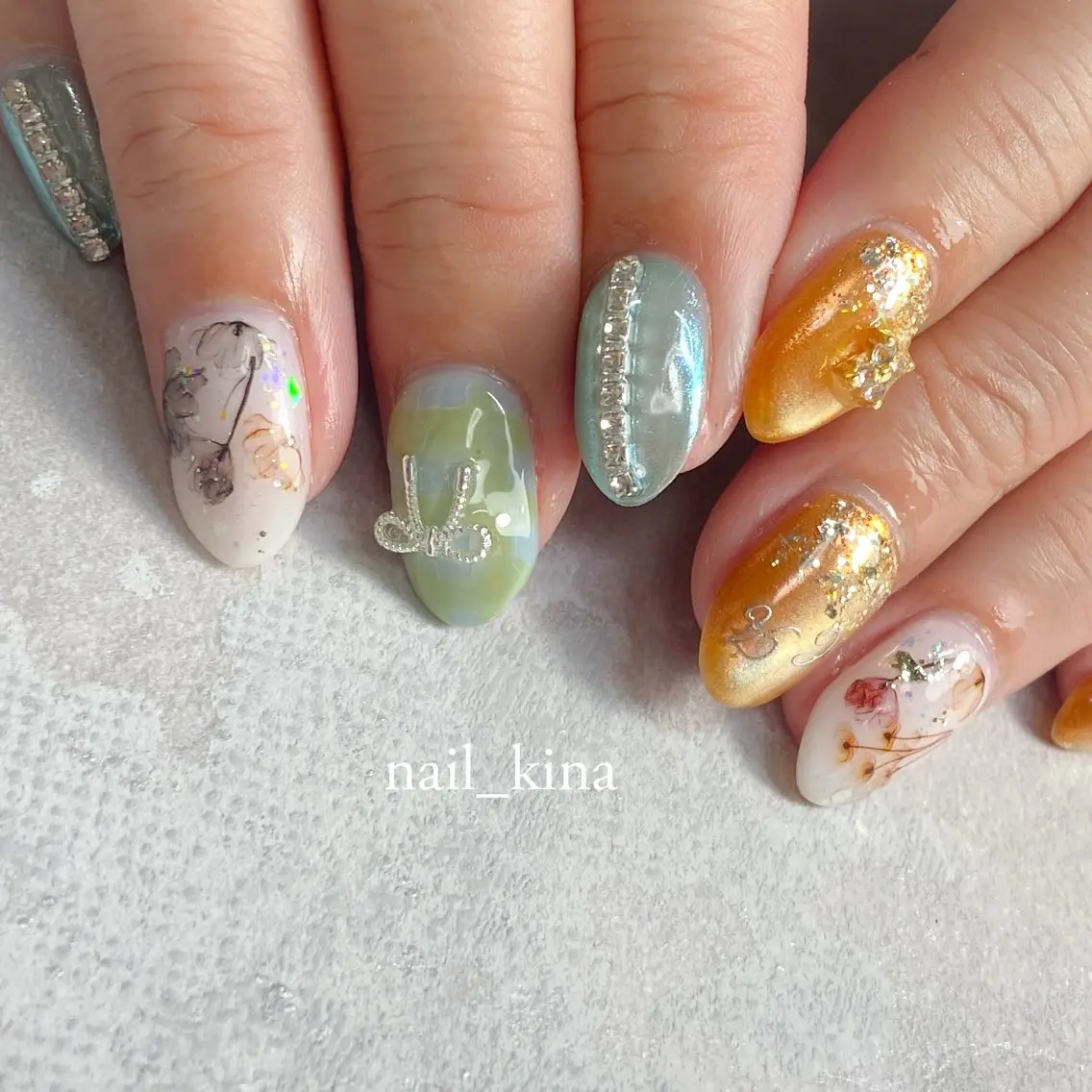 ネイル ブルー マグネットネイル オレンジ リボン nail_ kinaのネイルデザイン