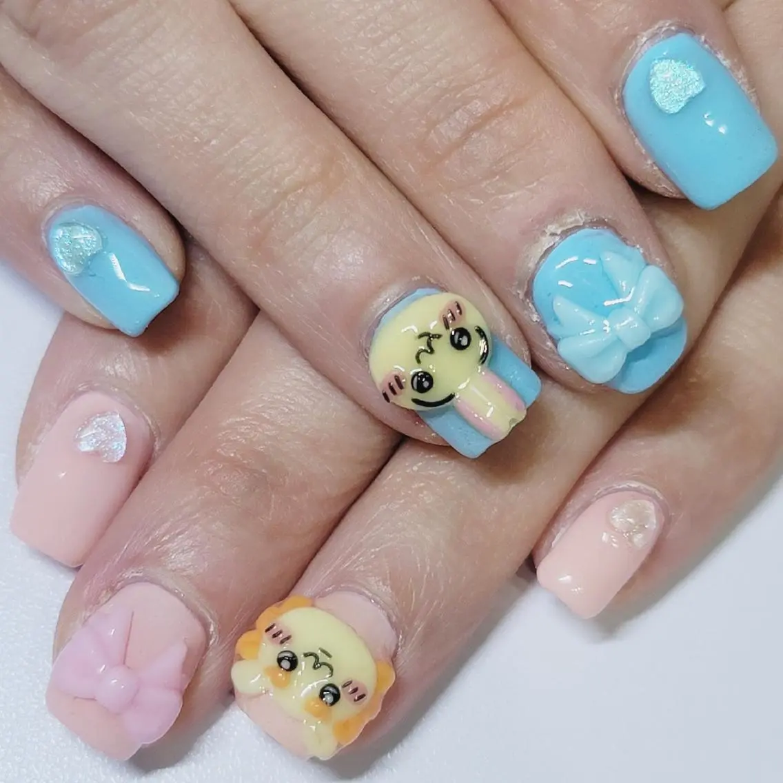 ネイル アートネイル ハート 水色 ピンク リボン ハンドネイル よしだ ひろきのネイルデザイン