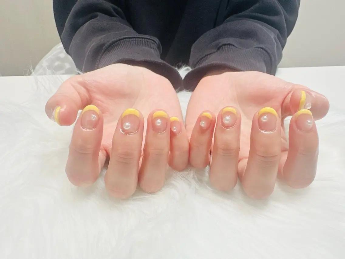 ネイル クリアネイル フレンチネイル ブライダルネイル 黄色 nailsalon oluoluのネイルデザイン