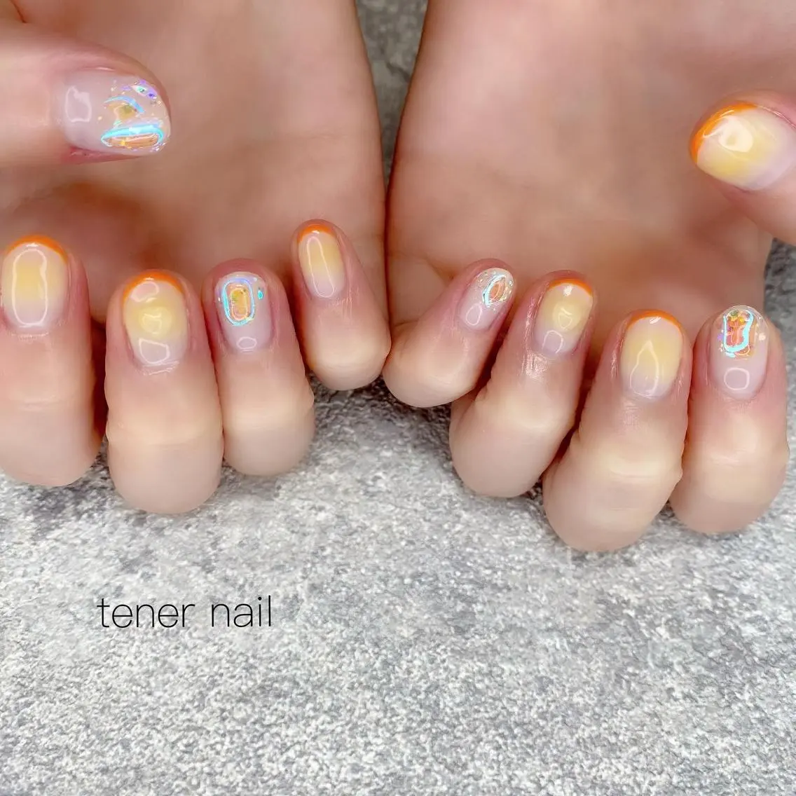 ネイル オーロラネイル チークネイル 韓国ネイル オレンジ ストーンネイル テネルネイル tener nailのネイルデザイン