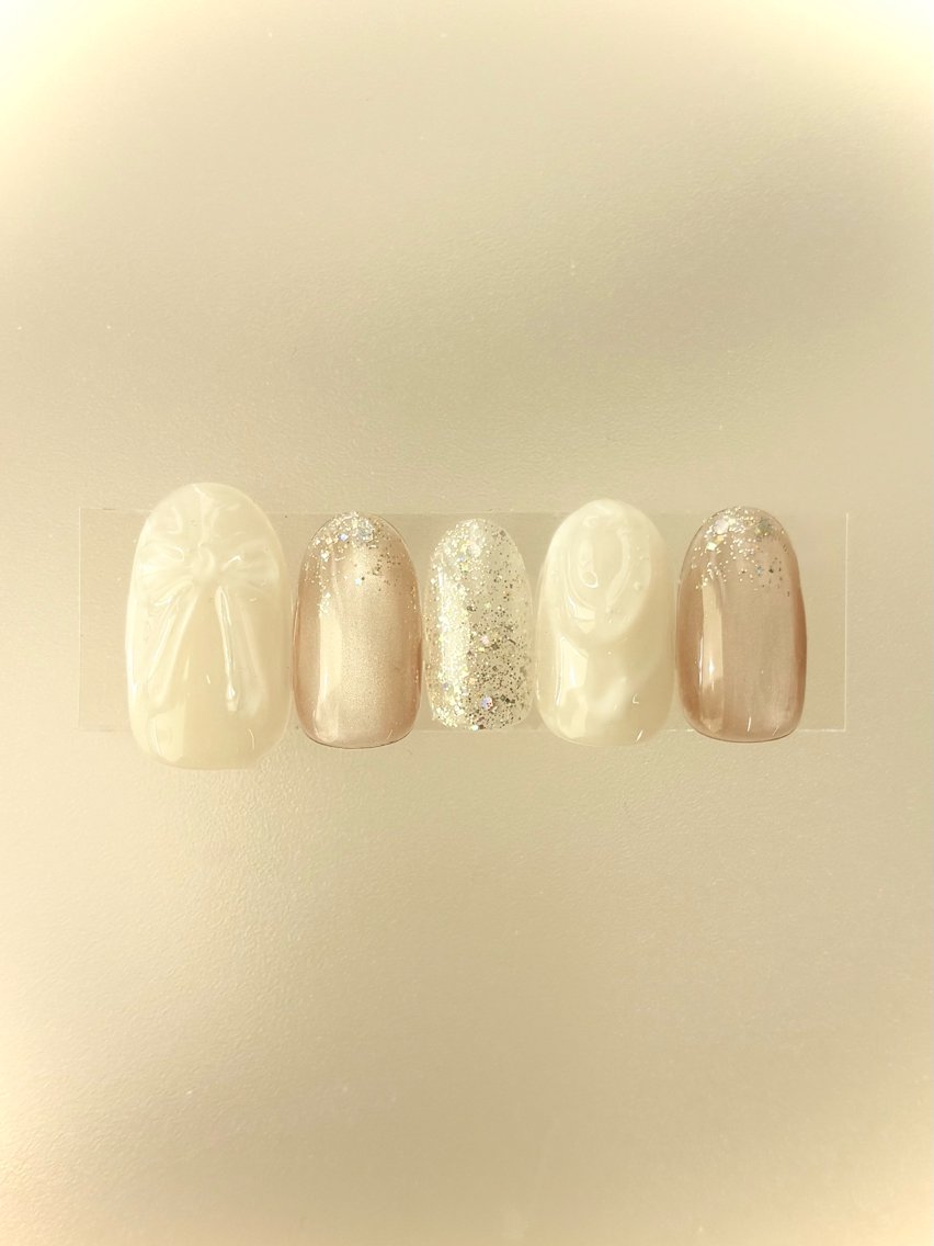 ネイル マグネットネイル ニュアンスネイル リボン ホワイト ハンドネイル Mary nail .narumiのネイルデザイン