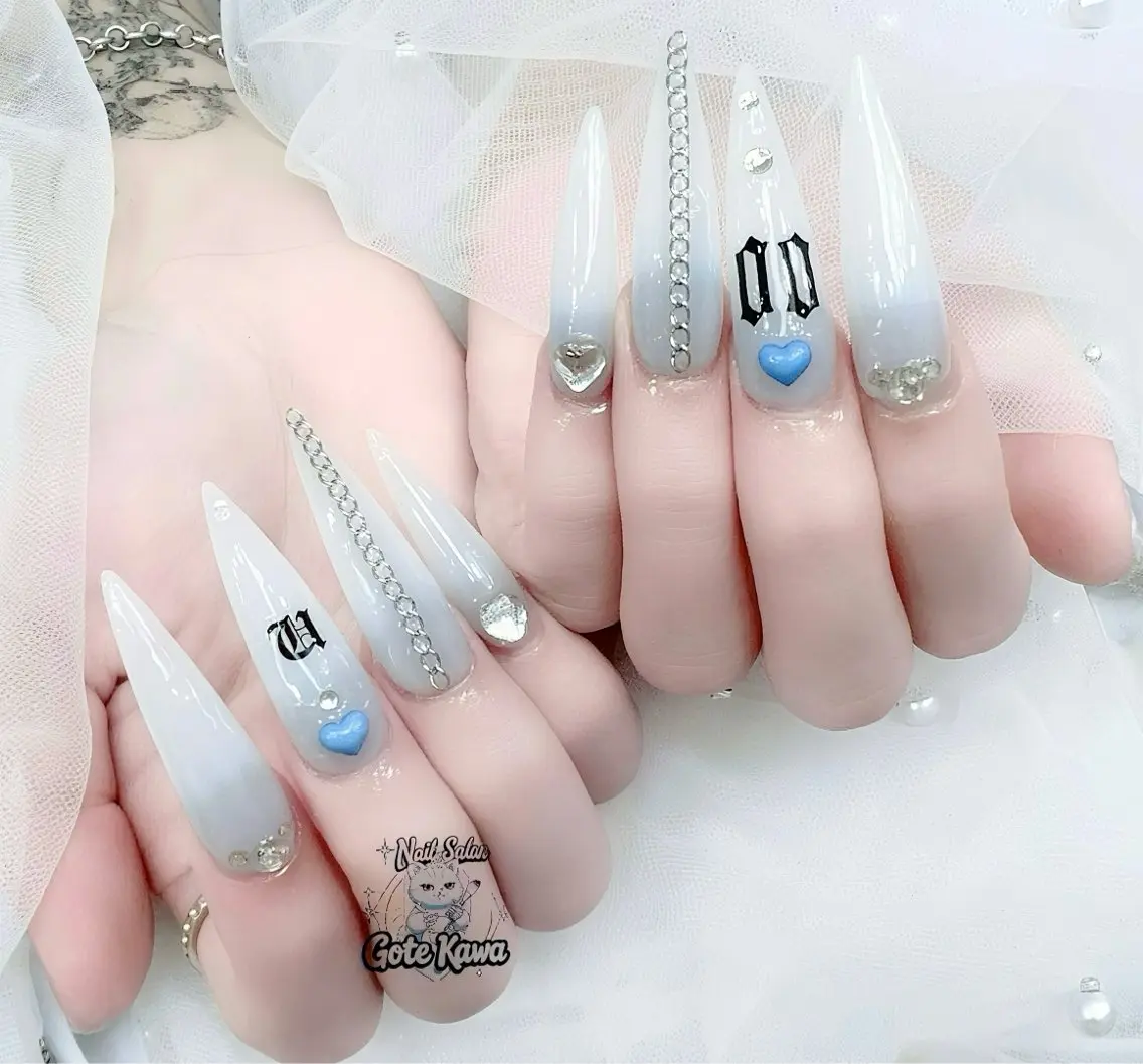 ネイル アートネイル 長さ出し キラキラネイル ピンク リボン Gote Kawa nail salonのネイルデザイン