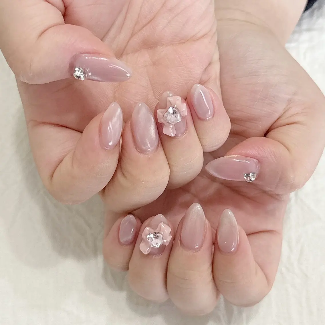 ネイル マグネットネイル ピンク リボン ストーンネイル ハンドネイル peaberry nailのネイルデザイン