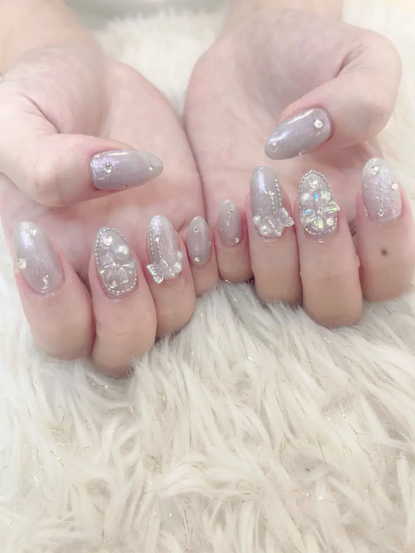 ネイル オーロラネイル マグネットネイル リボン ストーンネイル salon de Tiara 碧のネイルデザイン