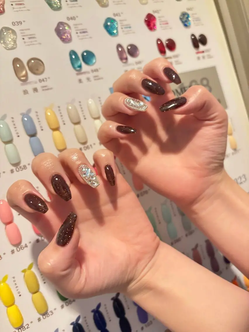 チップ長さ出し10本ワンカラー+2本埋め尽くし🎀の写真