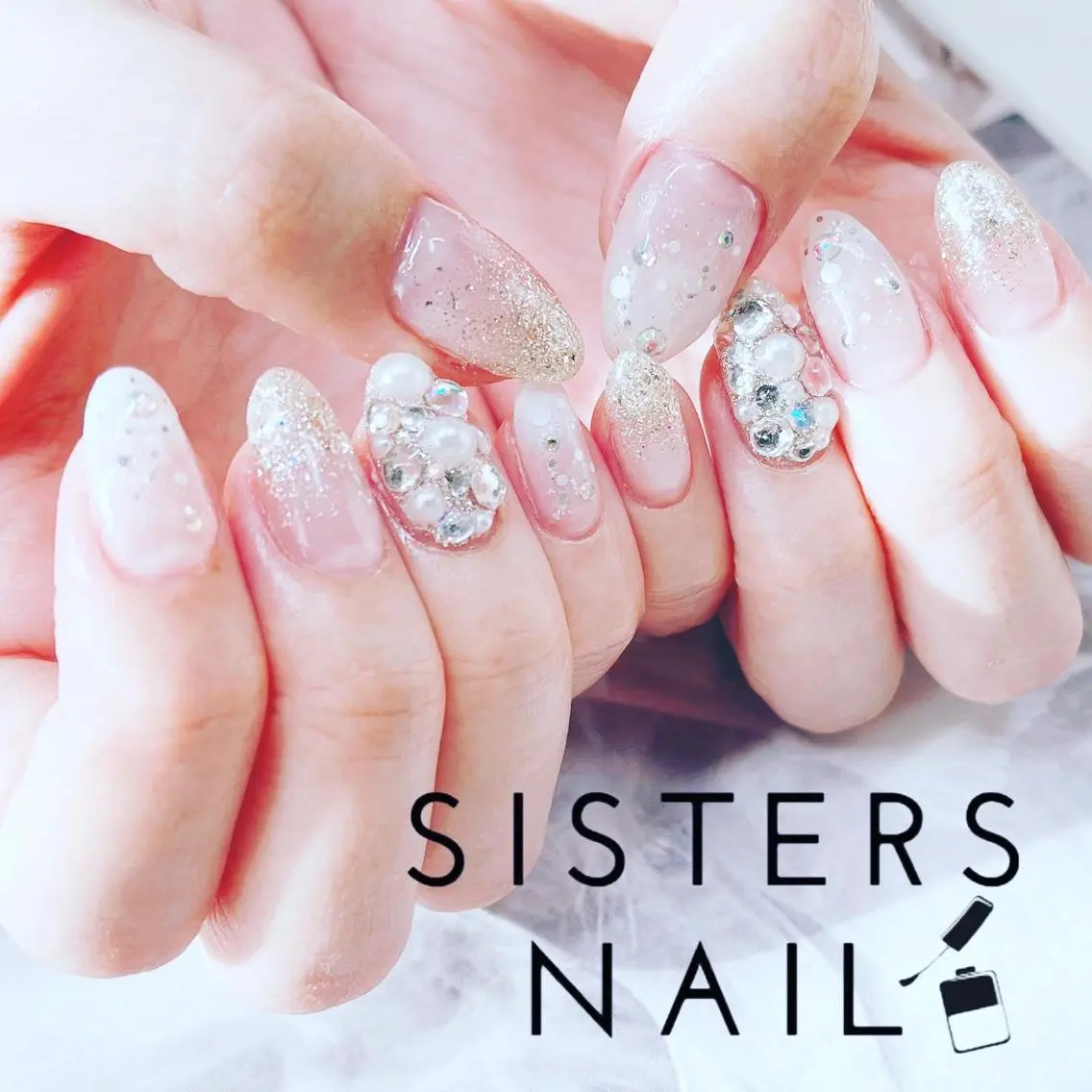 ネイル アートネイル キラキラネイル ラメ(グリッター) ストーンネイル ホワイト sisters nail.fのネイルデザイン