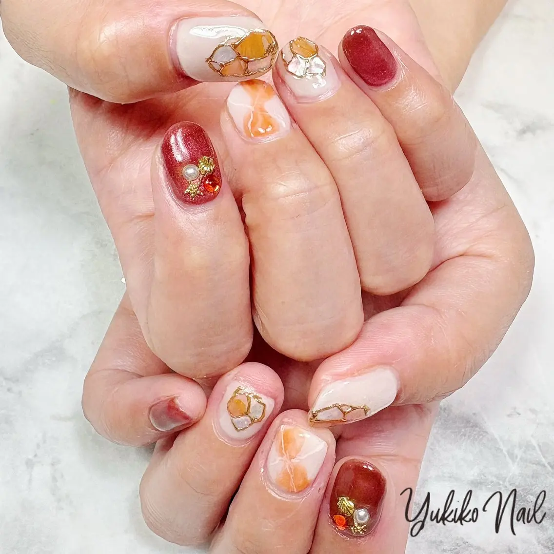 ネイル ニュアンスネイル オレンジ 赤色 ハンドネイル ユキコ ネイルのネイルデザイン