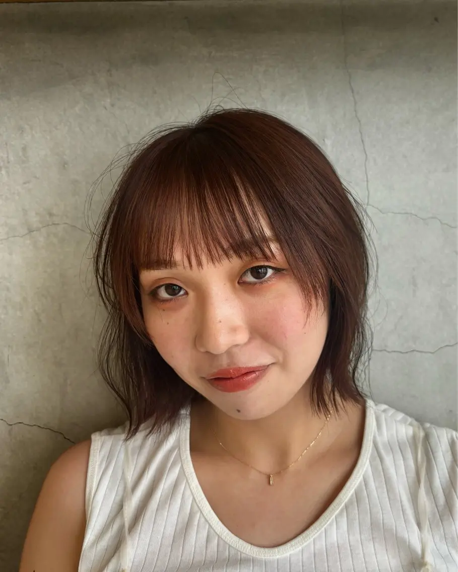 ショート カラー ブラウンカラー オレンジ オレンジブラウン ボブ 顔まわりレイヤー SLASHスラッシュ 辻村  彩華のヘアスタイル