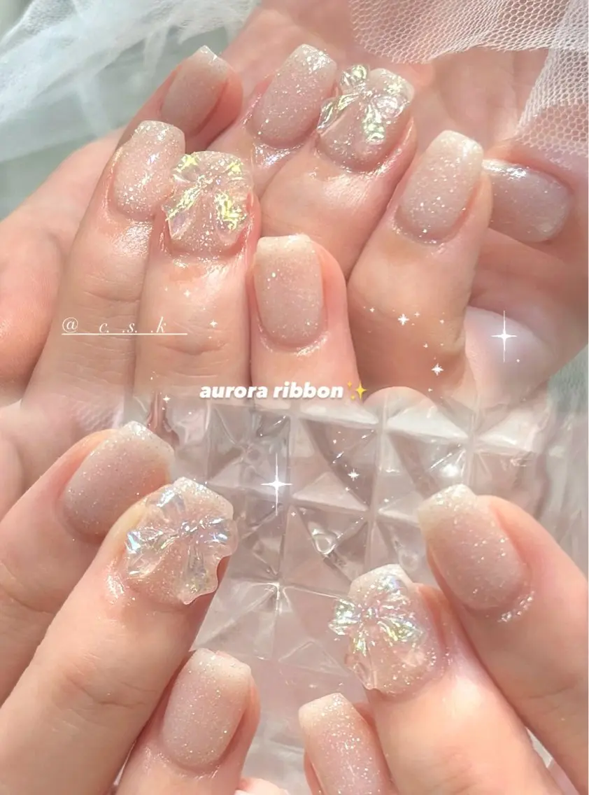 ネイル フラッシュネイル キラキラネイル リボン ハンドネイル 🎀チーク/ちゅるん 🫧chisa🎀のネイルデザイン