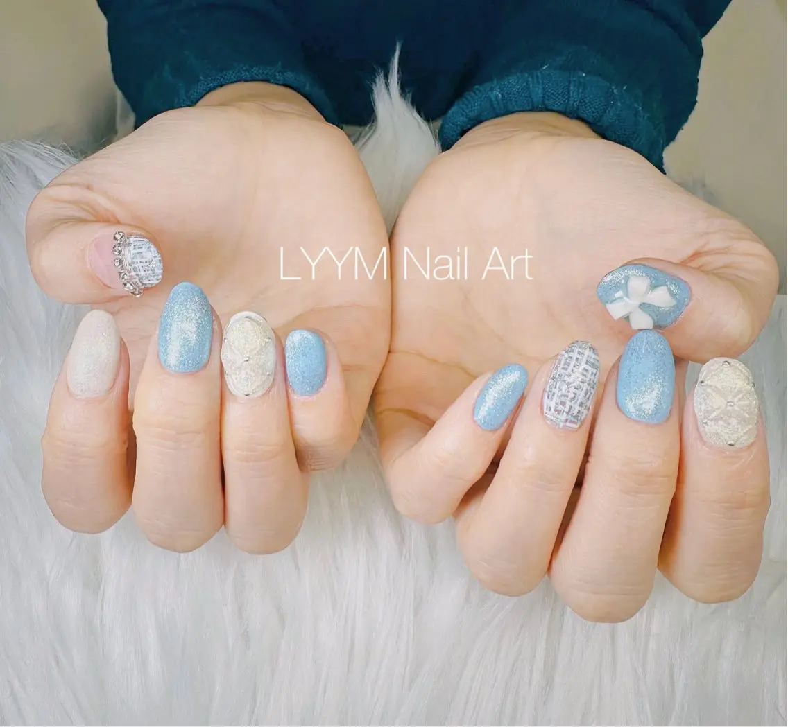ネイル アートネイル ブルー リボン LYYM Salonのネイルデザイン