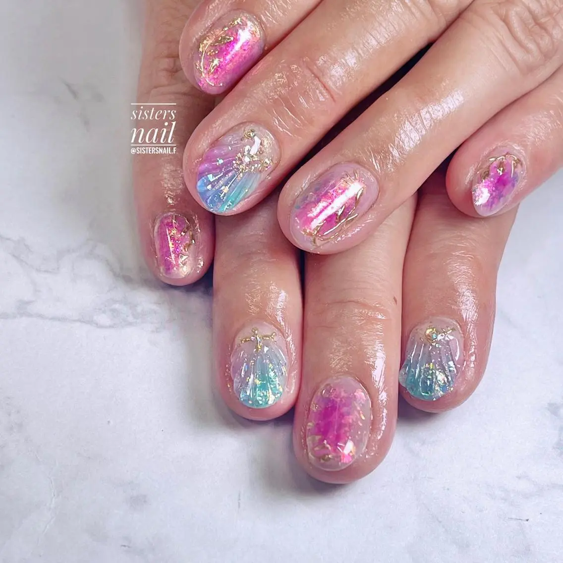 ネイル アートネイル オーロラネイル クリアネイル ジェルネイル ゴールド sisters nail.fのネイルデザイン
