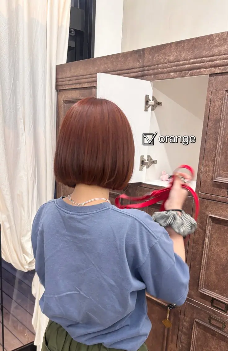 カラー オレンジ ウエチ モモカのヘアスタイル