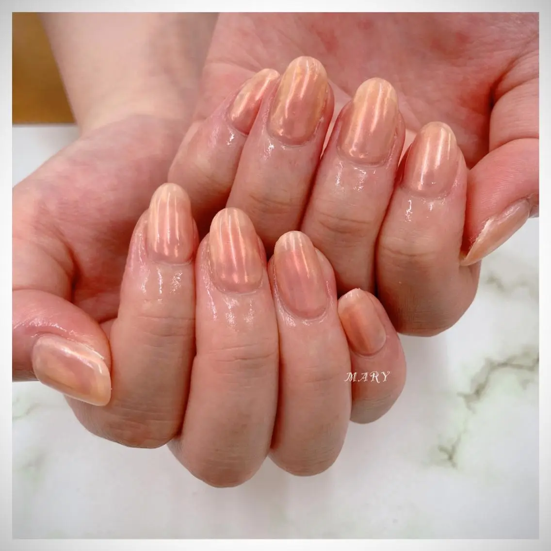 ネイル オーロラネイル ミラーネイル ニュアンスネイル ワンカラーネイル オレンジ ハンドネイル Mary nail .narumiのネイルデザイン