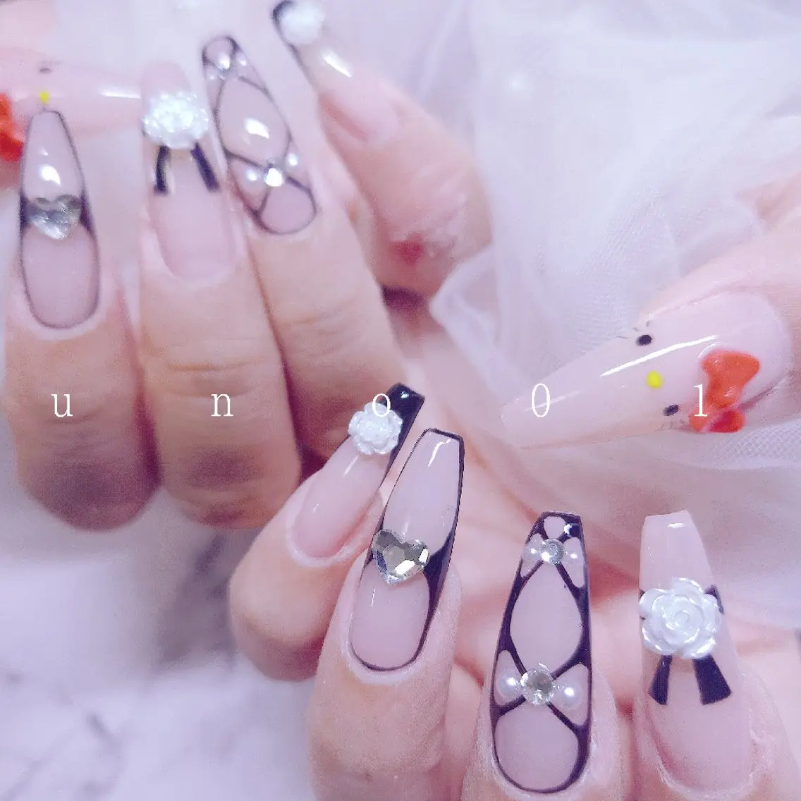 ネイル アートネイル ロングネイル ハンドネイル 梅田🦄中崎町🩵 u n o 0 1のネイルデザイン