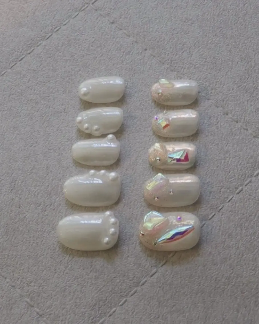 ネイル オーロラネイル ブライダルネイル nail salon swaddle 🪽のネイルデザイン