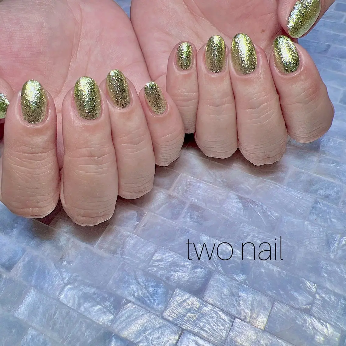 ネイル キラキラネイル ネイルチップ ホワイト ハンドネイル two nailのネイルデザイン