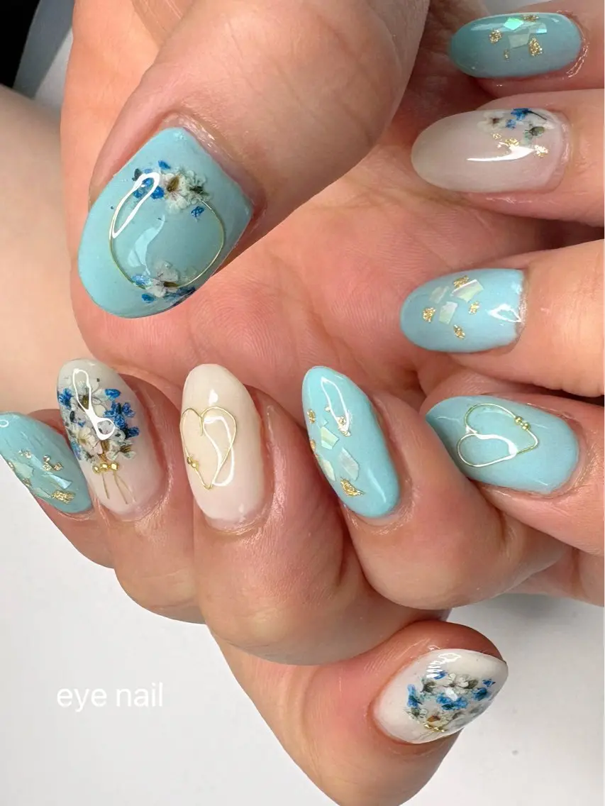 ネイル アートネイル ブルー フラワーネイル ジェルネイル ホワイト ハンドネイル Eye nailのネイルデザイン
