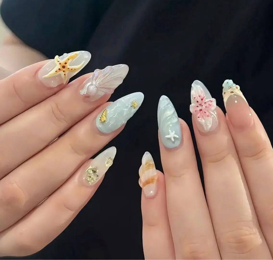 海を閉じ込めたようなネイル🌴✨見てるだけで癒される♡ 海ネイルのデザインからお好きなものをお選びください🌊✨の写真