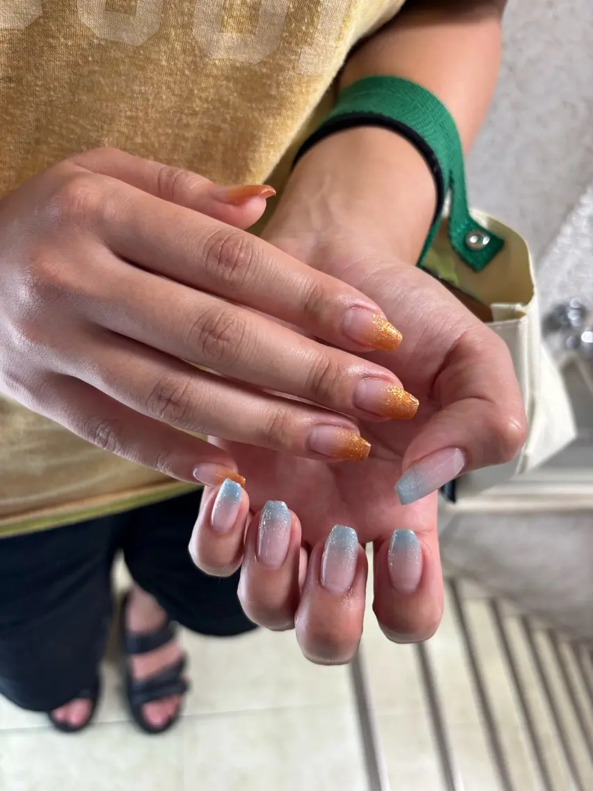 ネイル 水色 オレンジ Bianca浦和🍀 suminaのネイルデザイン