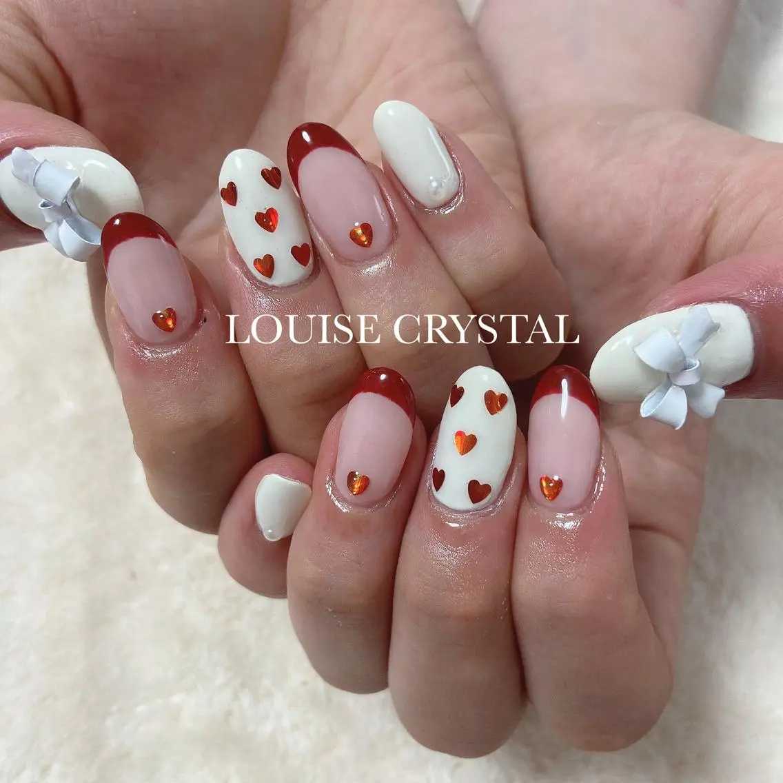 ネイル リボン ハンドネイル LOUISE CRYSTALのネイルデザイン