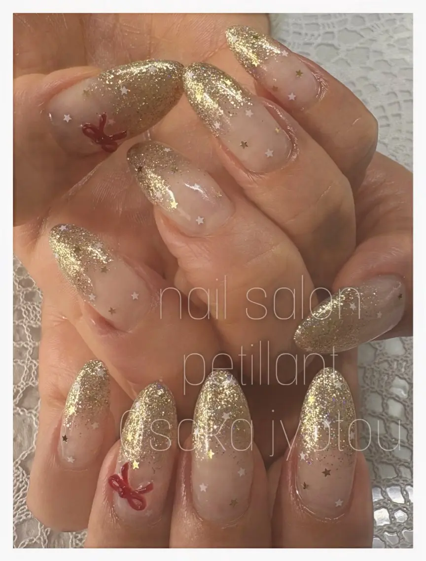 ネイル アートネイル 赤色 リボン nail salon petillantのネイルデザイン