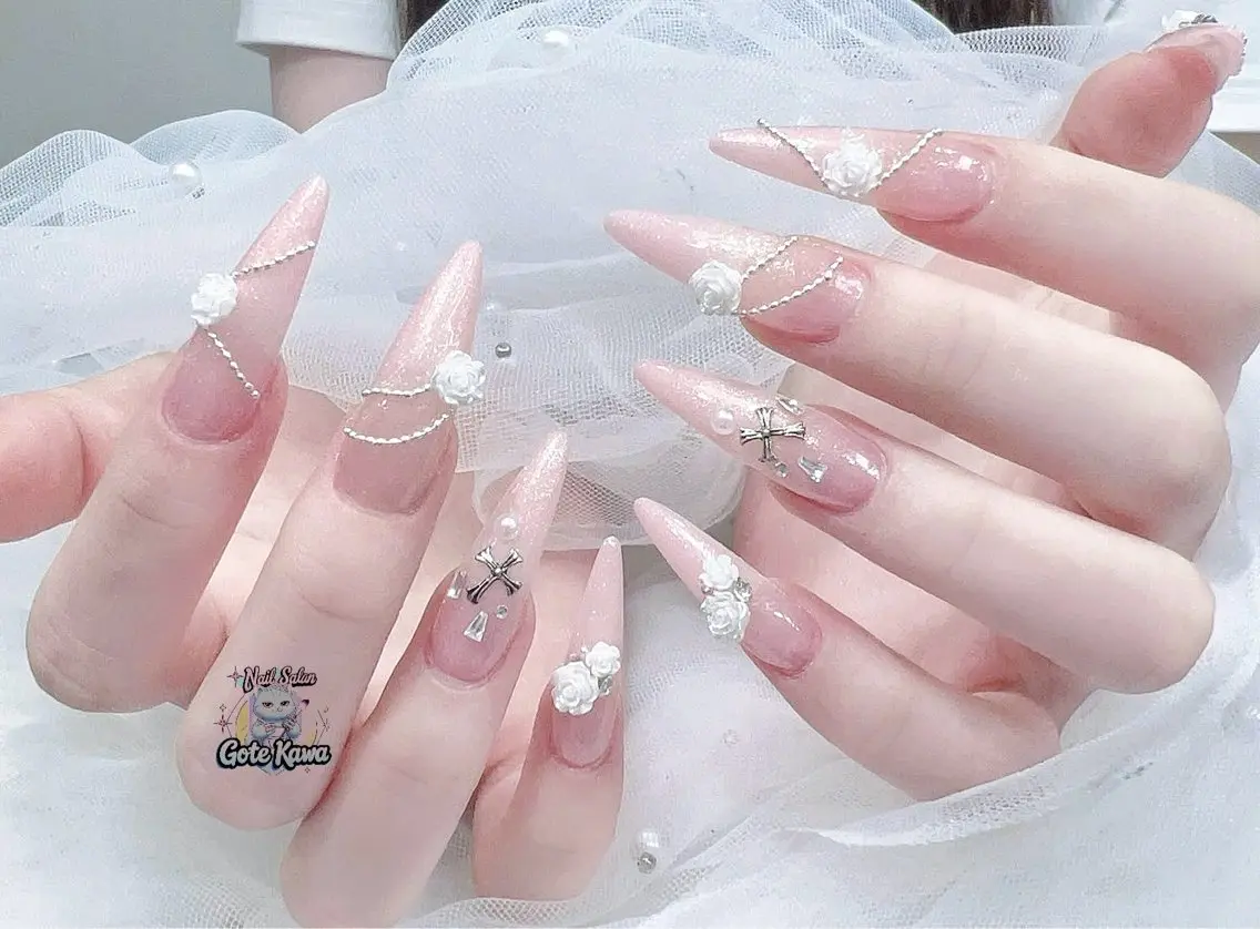 ネイル アートネイル 長さ出し キラキラネイル ピンク リボン ハンドネイル ハンドケア Gote Kawa nail salonのネイルデザイン