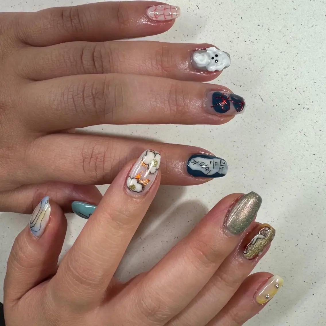 ネイル アートネイル べっ甲ネイル ジェルネイル グリーン キラキラネイル nailstudio eviz新宿店のネイルデザイン
