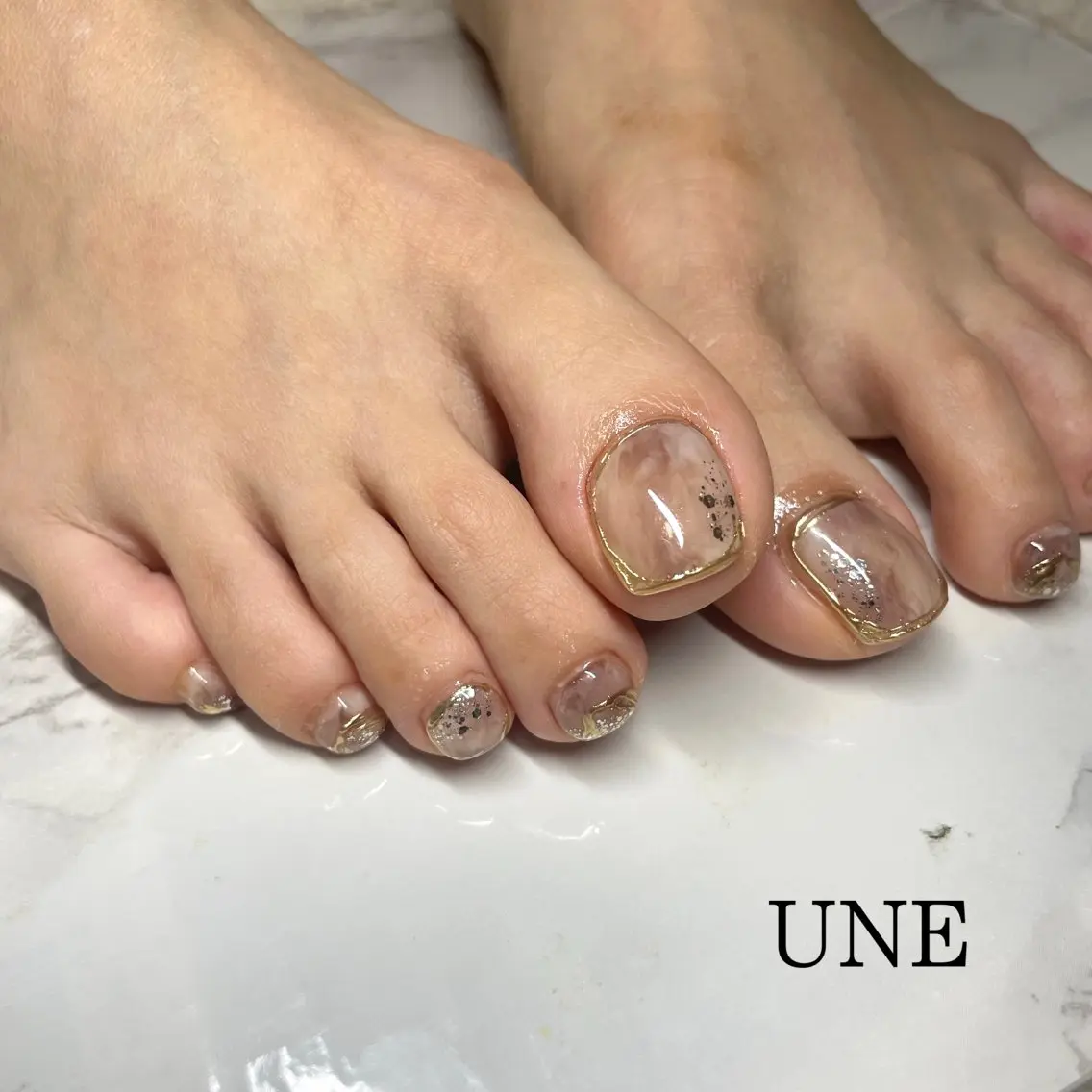ネイル ニュアンスネイル フットネイル UNE.【ユヌ】 Jr.NANAのネイルデザイン