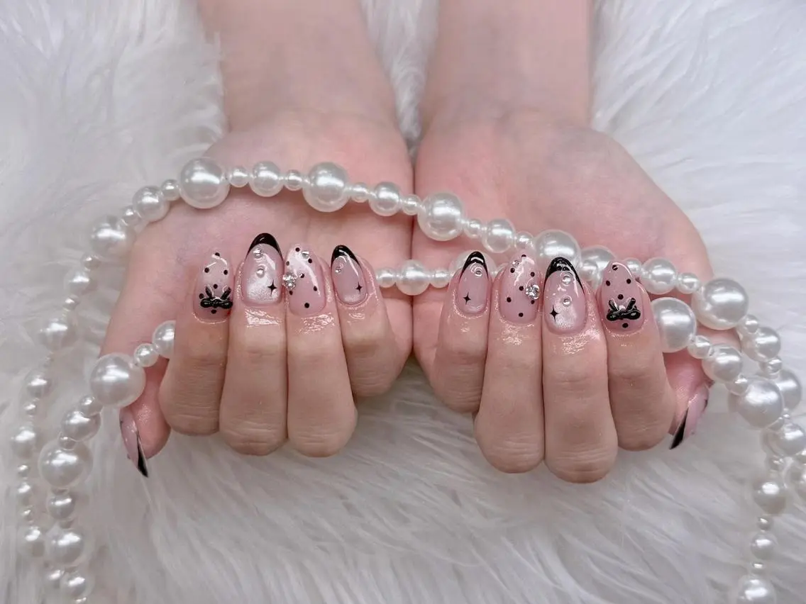 ネイル ガーリー 韓国ネイル 持ち込み リボン ワンホンネイル Melia Nail Nambaのネイルデザイン