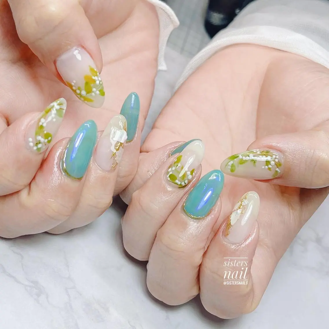 ネイル アートネイル オーロラネイル ブルー フラワーネイル キラキラネイル sisters nail.fのネイルデザイン