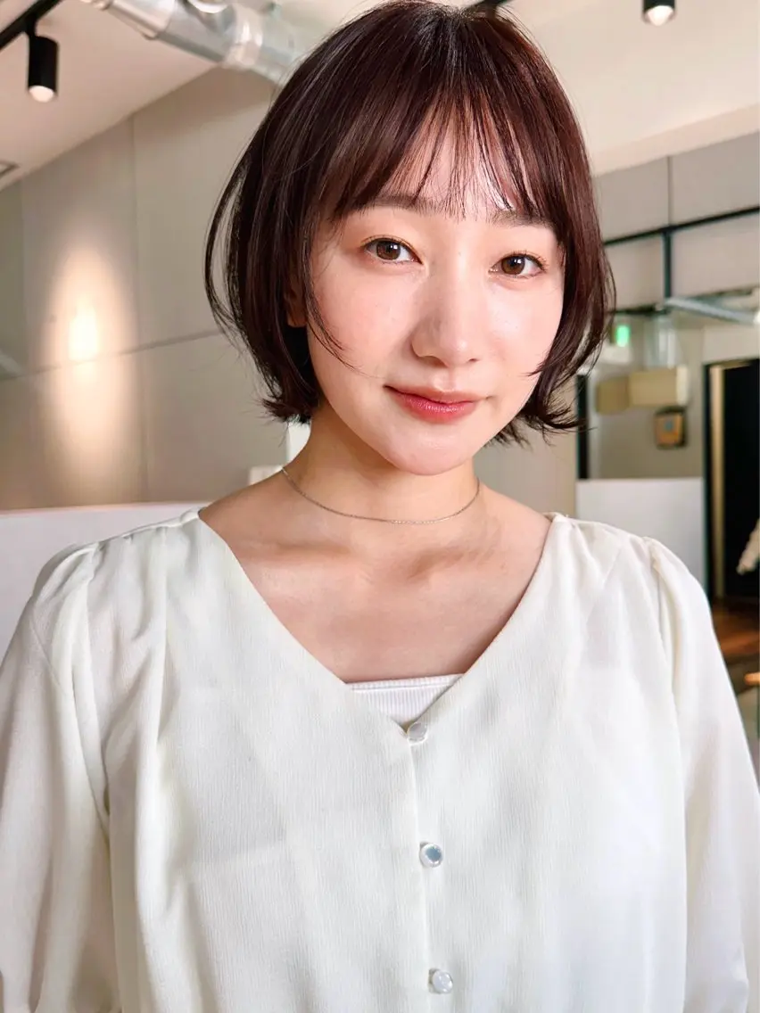 ショート カラー パーマ kazuki【顔周り ×レイヤーカット】のヘアスタイル