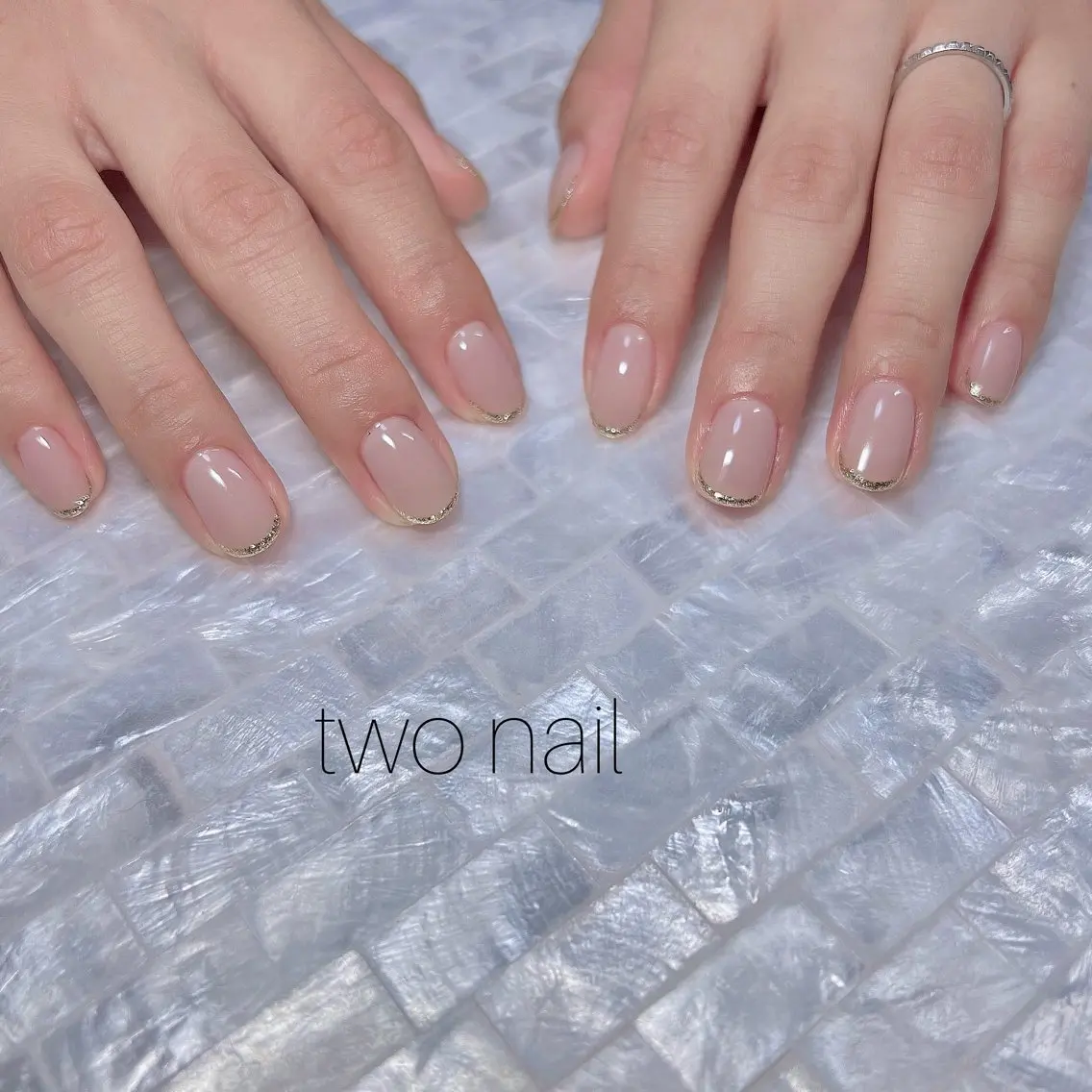 ネイル キラキラネイル ネイルチップ ホワイト ハンドネイル two nailのネイルデザイン