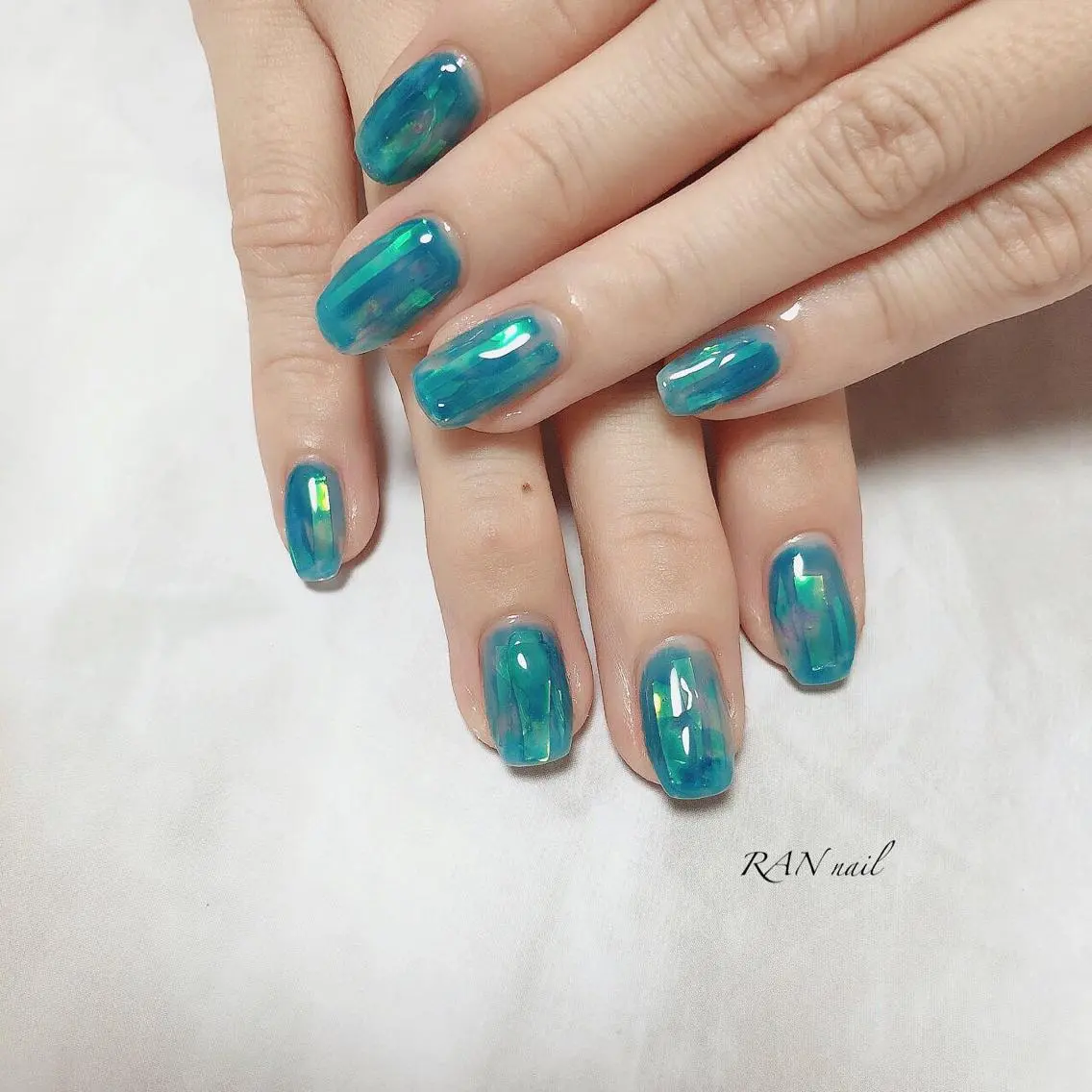 ネイル オーロラネイル ブルー クリアネイル 氷ネイル・うるうるネイル キラキラネイル RAN nailのネイルデザイン