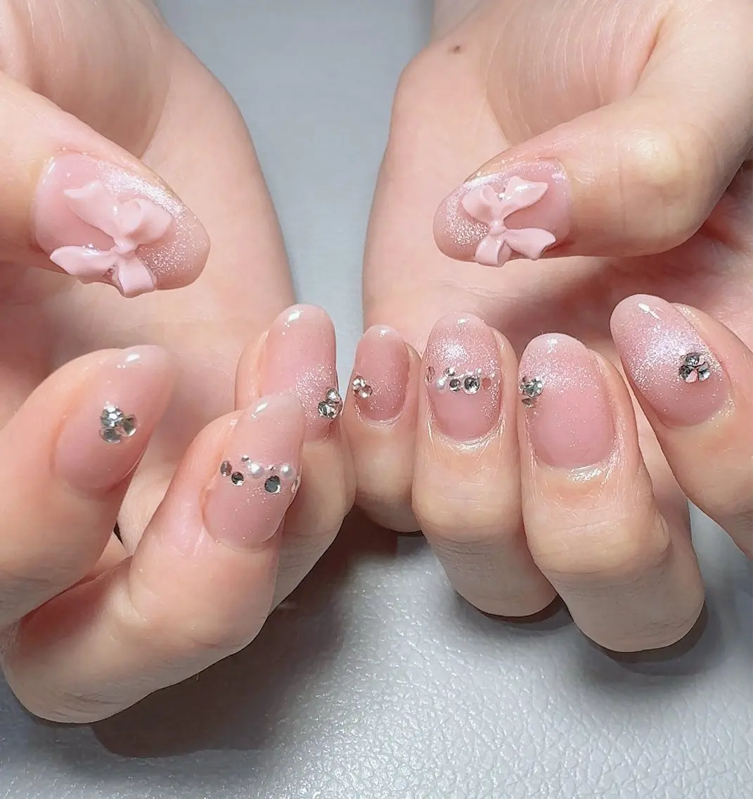 ネイル キラキラネイル マグネットネイル ピンク リボン nailsalon urümのネイルデザイン