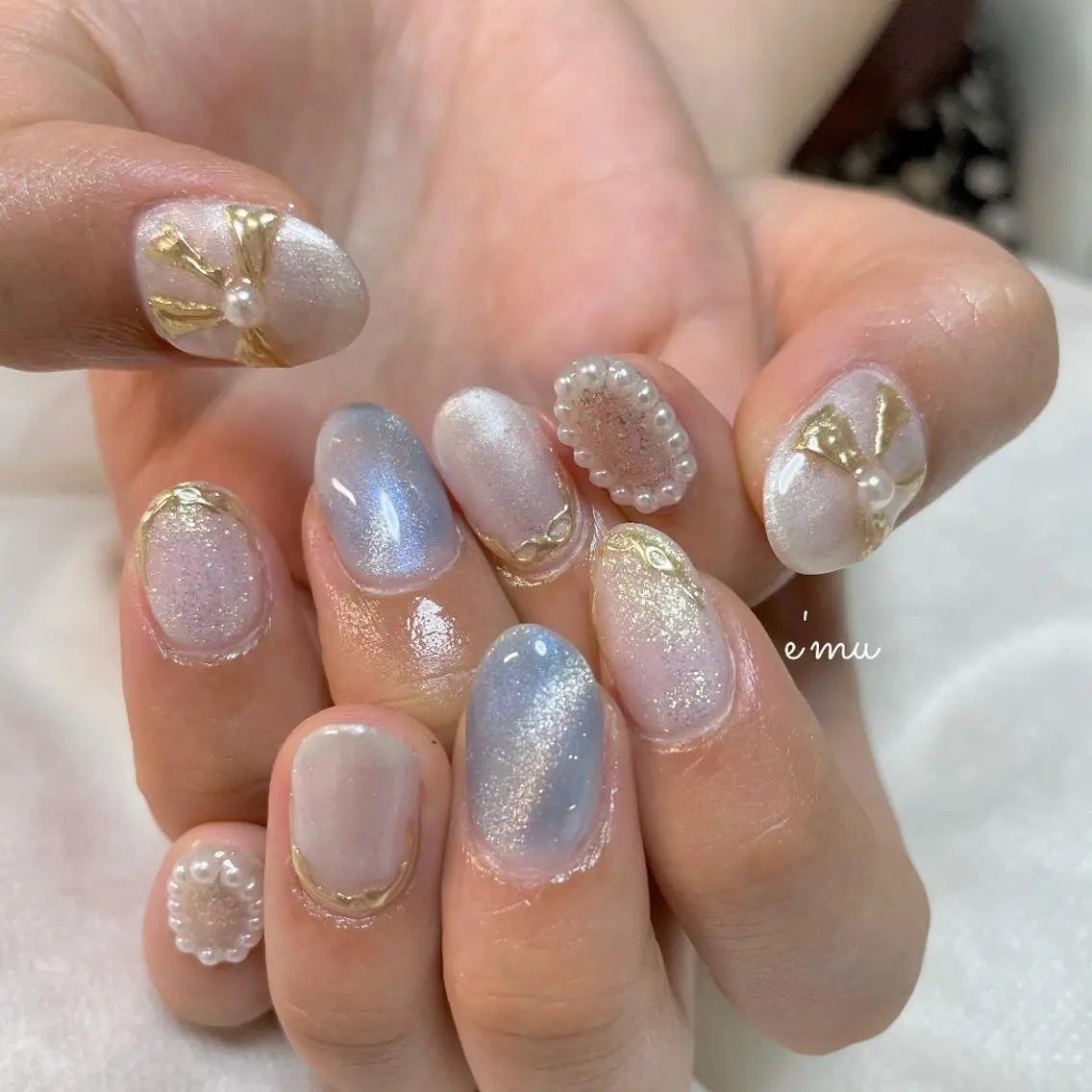 ネイル マグネットネイル リボン nail salon e'mu💐のネイルデザイン