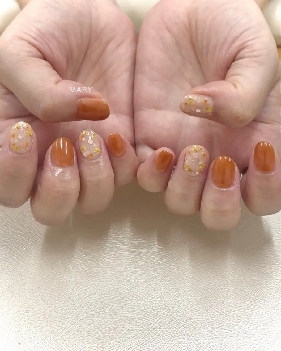 ネイル フラワーネイル ワンカラーネイル オレンジ ハンドネイル Mary nail .narumiのネイルデザイン