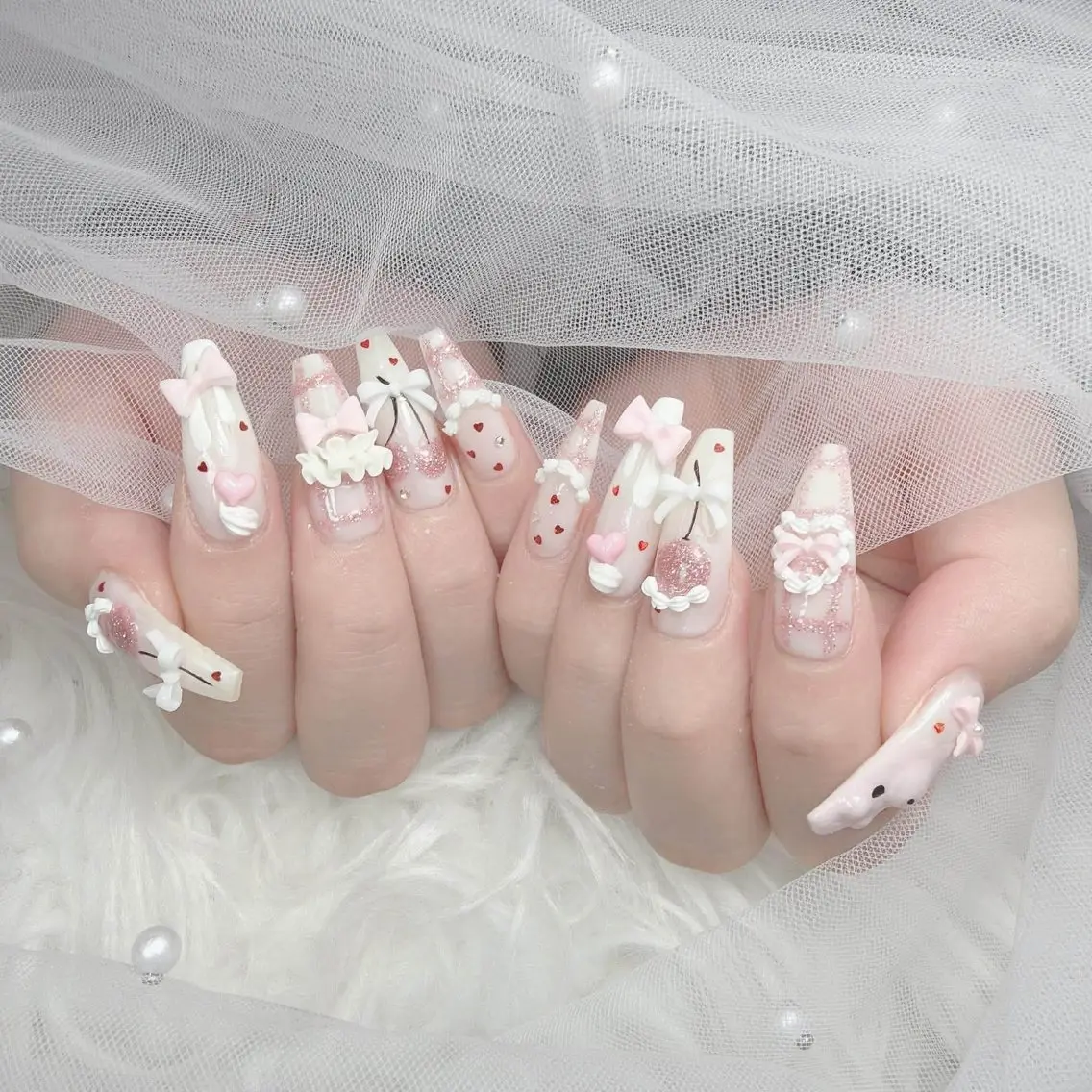 ネイル ハート リボン 春ネイル ハンドネイル ハンドケア Gote Kawa nail salonのネイルデザイン