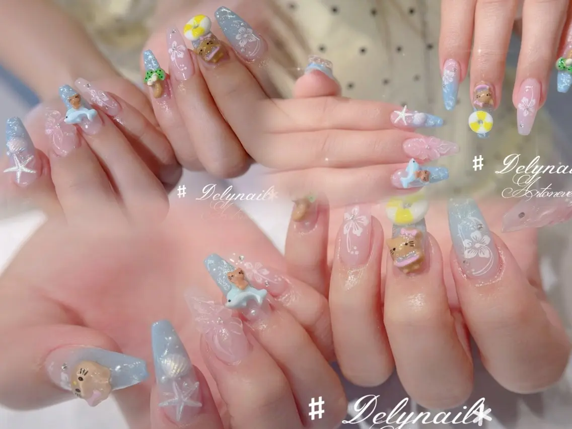 ネイル ブルー 長さ出し キラキラネイル 韓国ネイル ロングネイル ハンドネイル Dely Nailのネイルデザイン
