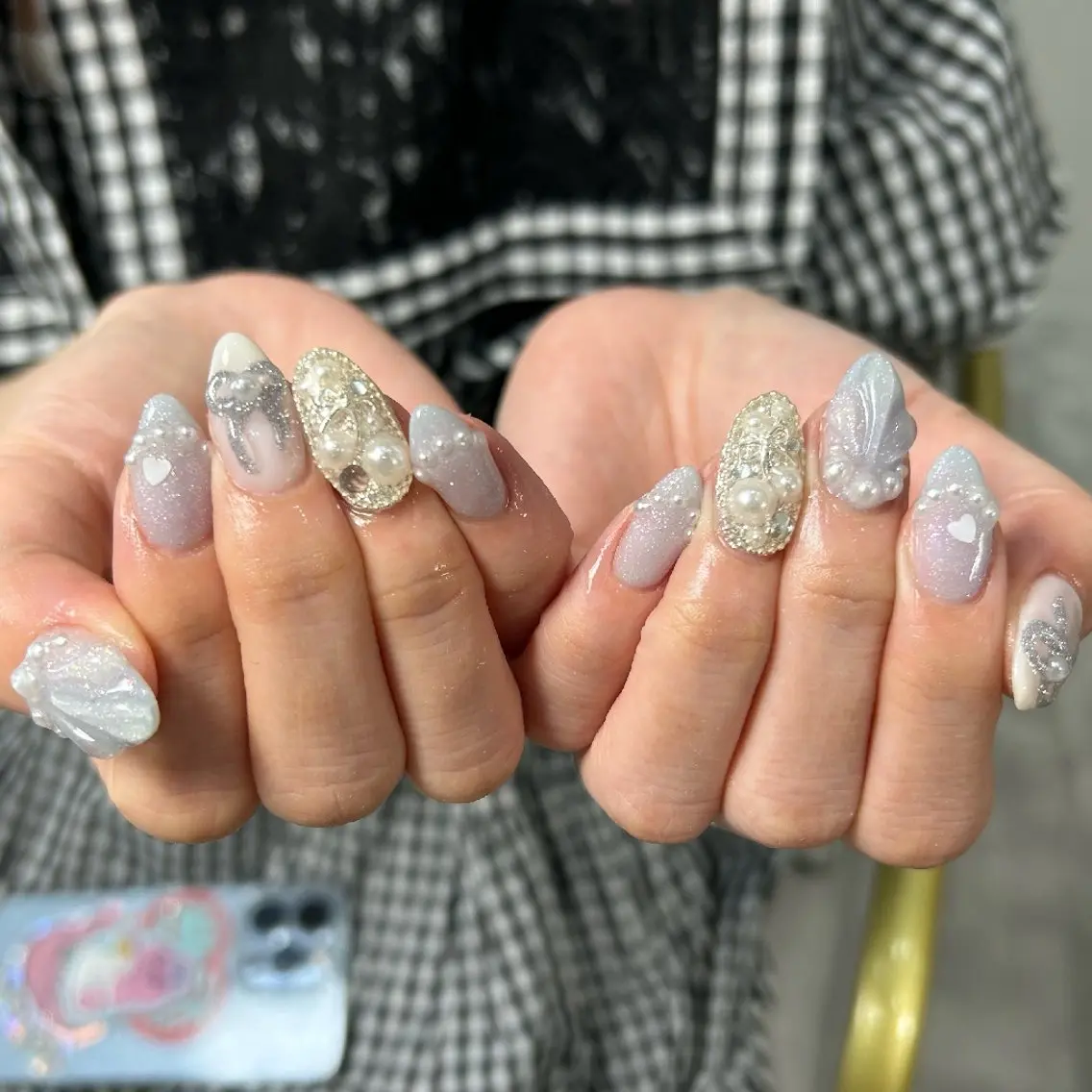 ネイル キラキラネイル 水色 持ち込み リボン ハンドネイル UM Nail Salonのネイルデザイン