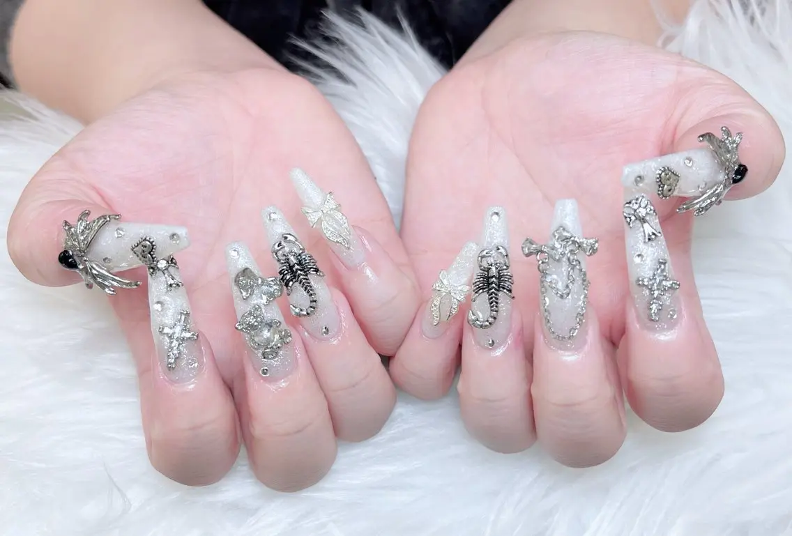 ネイル 成人式 ロングネイル マグネットネイル 大理石ネイル(マーブル) リボン ハンドネイル Amee Nail Salonのネイルデザイン
